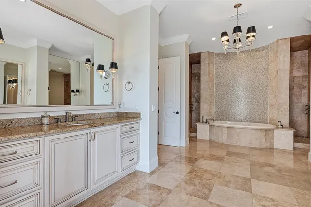 a view of swimming pool with outdoor seating