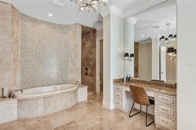 a view of a patio with table and chairs under an umbrella with a patio