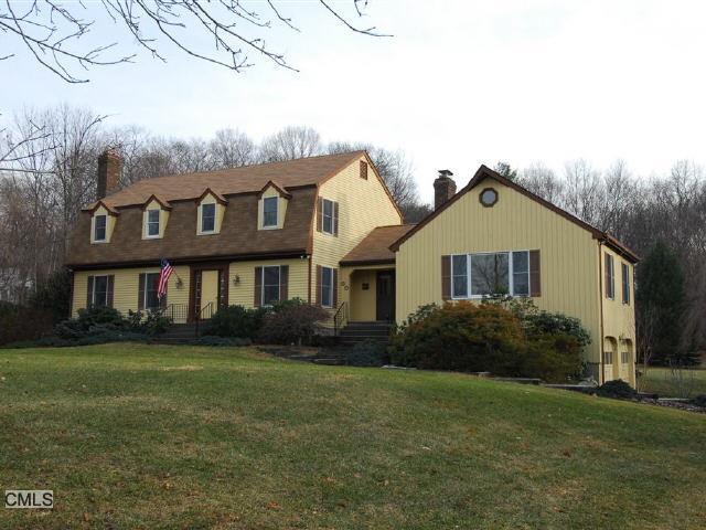 30 East Farm Lane Ridgefield, CT 06877 - Photo 1 of 1 a front view of a house with garden