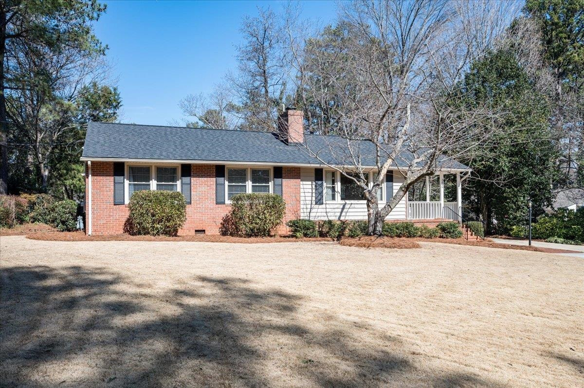 3426 Redbud Lane Raleigh, NC 27607 - Photo 2 of 30 Sink your feet into the easy care Leisure Time Zoysia grass-low maintenance and thrives in summer heat!