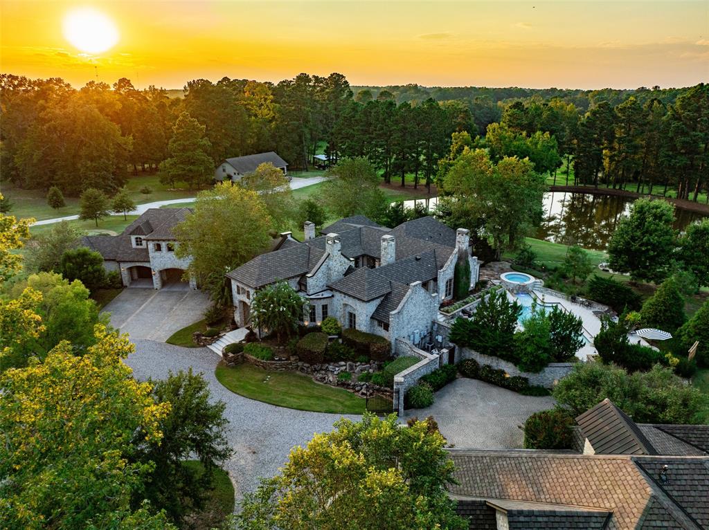 an aerial view of a house with mountain view