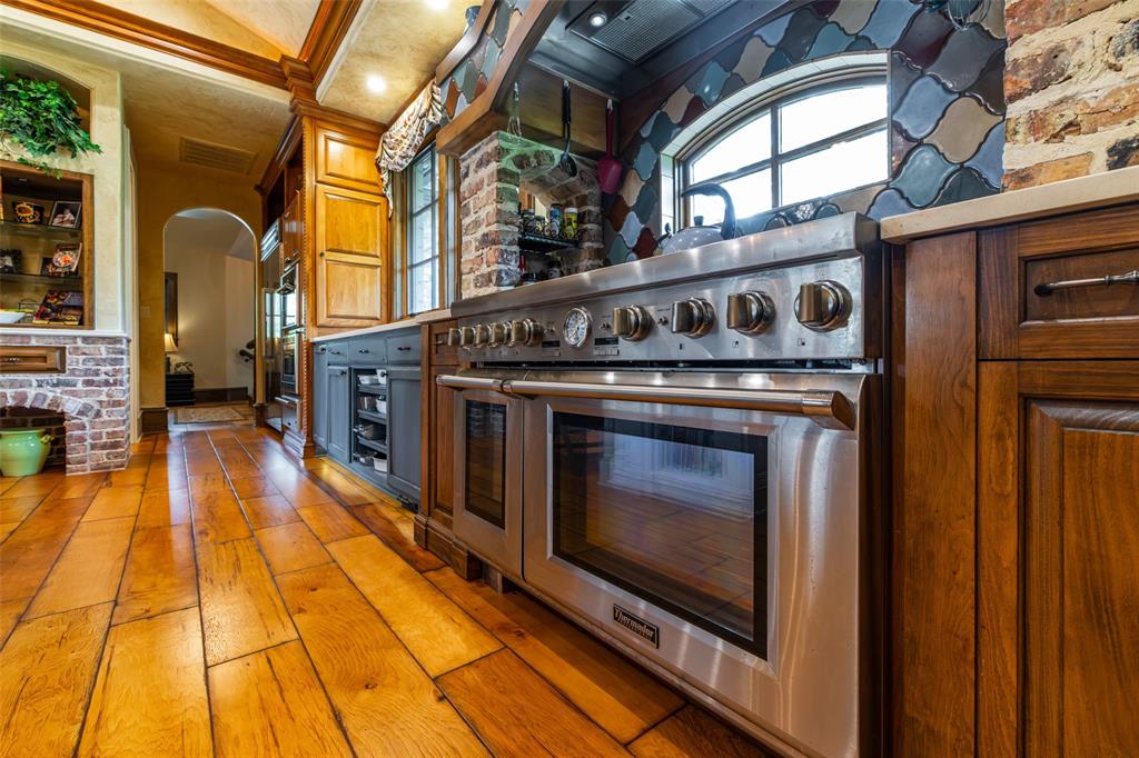 325 Young Road Hallsville, TX 75650 - Photo 17 of 39 a stove top oven sitting inside of a kitchen