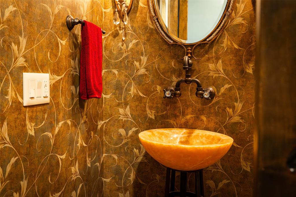 325 Young Road Hallsville, TX 75650 - Photo 18 of 39 a bathroom with a sink and a mirror