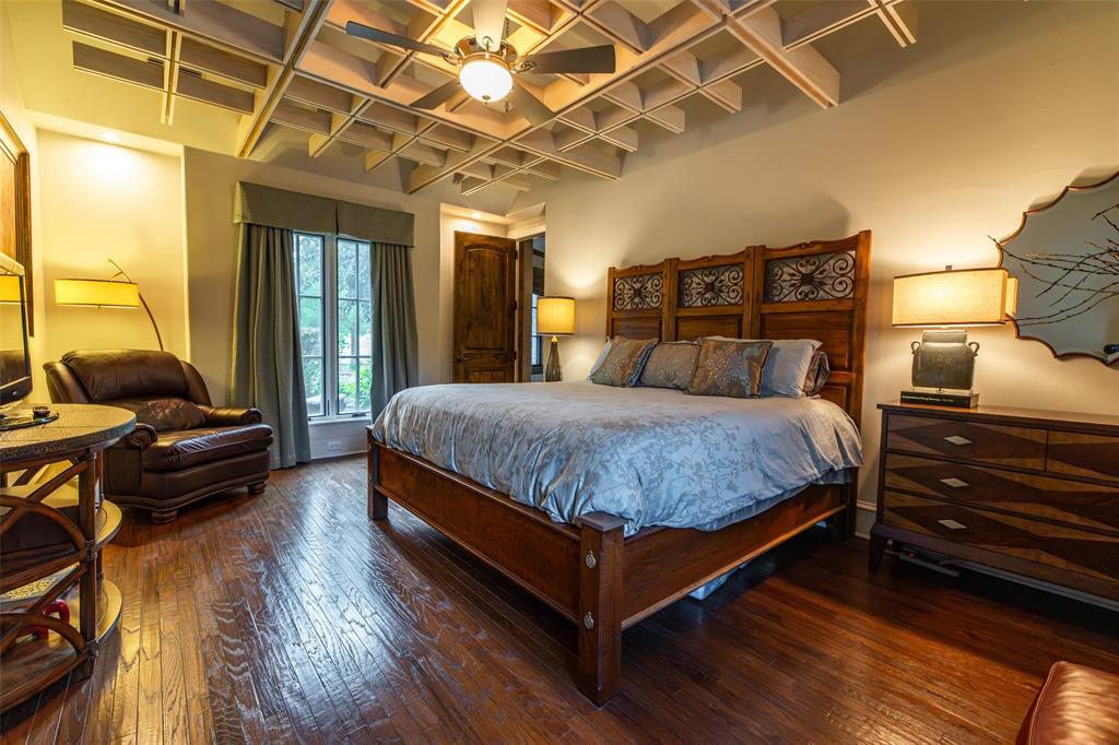 325 Young Road Hallsville, TX 75650 - Photo 25 of 39 a bedroom with a bed and wooden floor