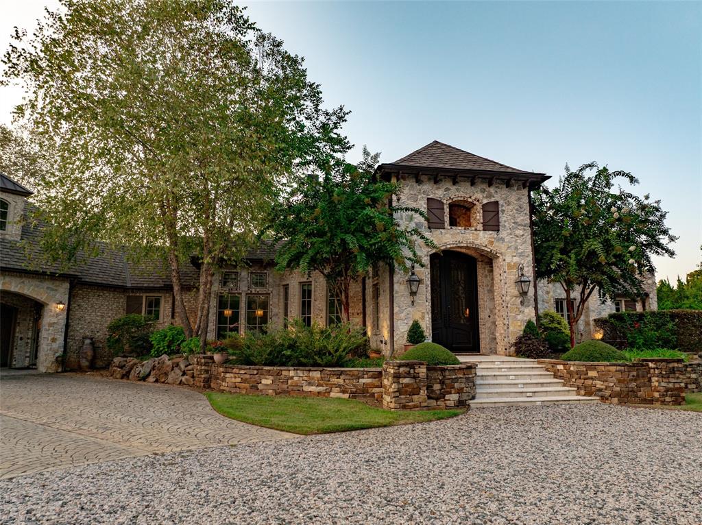 325 Young Road Hallsville, TX 75650 - Photo 5 of 39 a front view of a house with garden