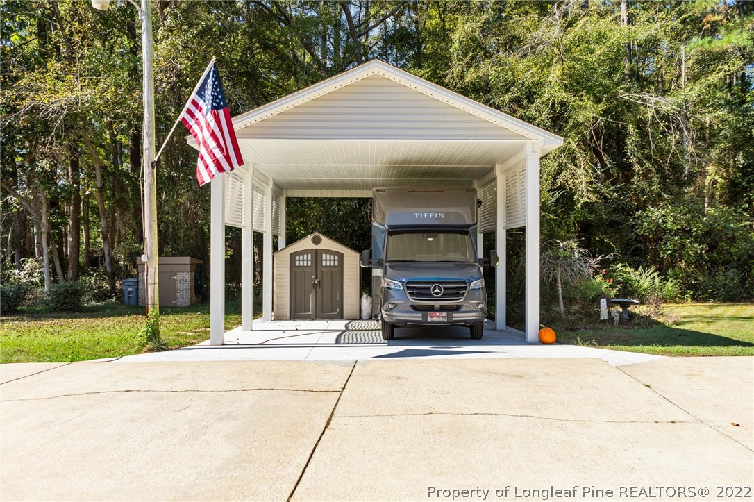 1533 Carl Freeman Road Stedman, NC 28391 - Photo 23 of 48 a view of a car park in front of house
