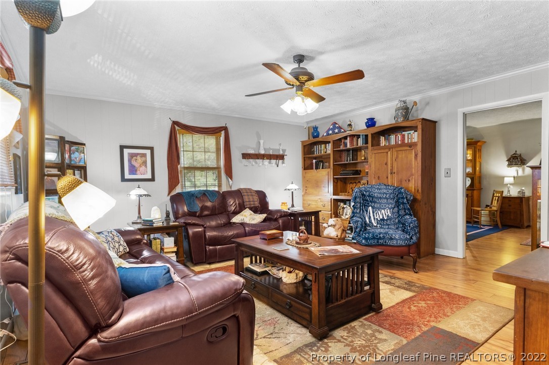 1533 Carl Freeman Road Stedman, NC 28391 - Photo 30 of 48 a living room with furniture and a window