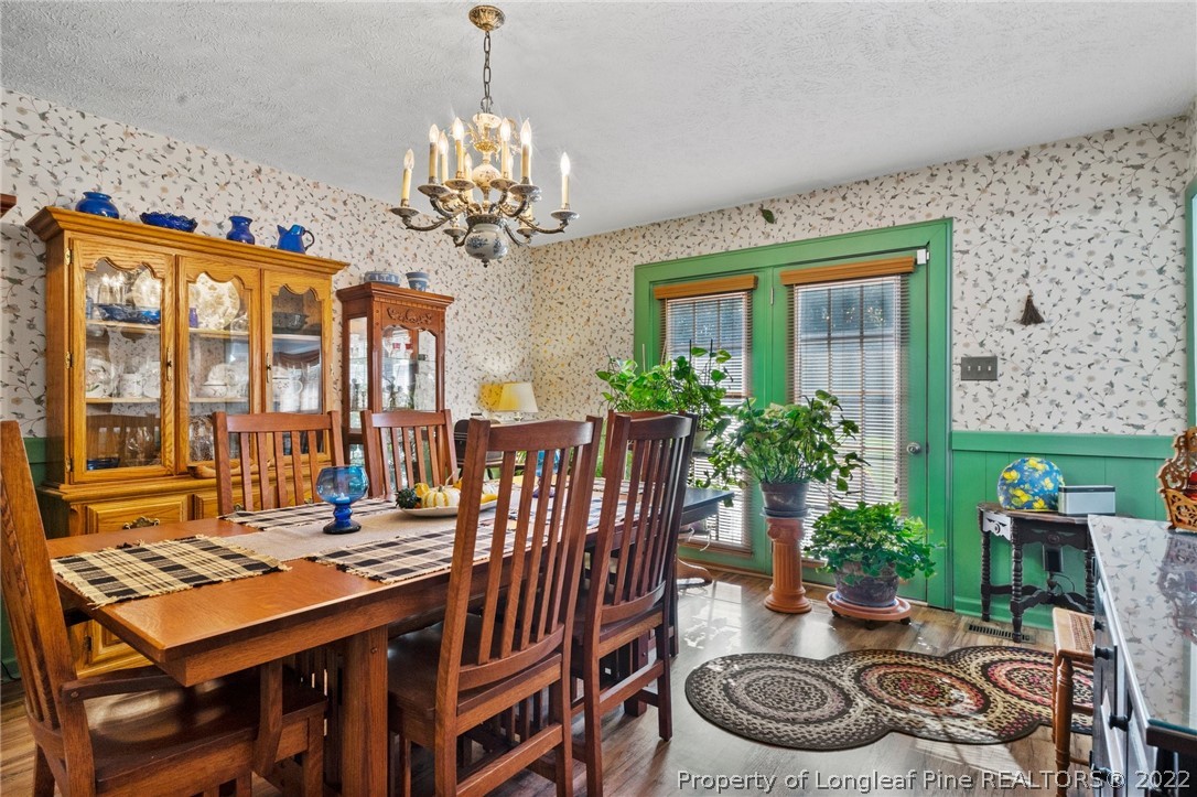 1533 Carl Freeman Road Stedman, NC 28391 - Photo 35 of 48 a view of a dining room with furniture window and outside view