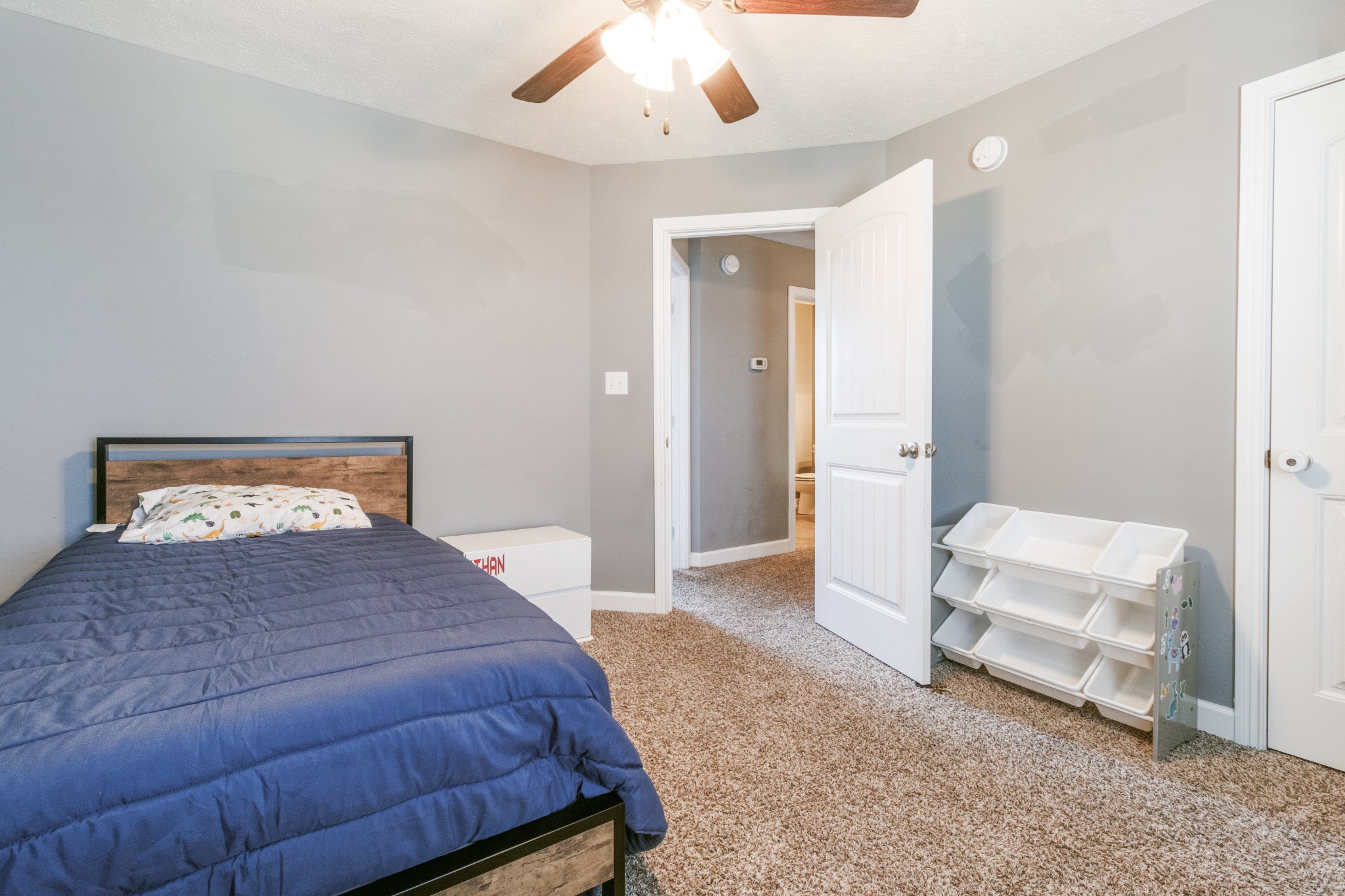 3794 Suiter Road Clarksville, TN 37040 - Photo 18 of 26 a bedroom with a bed and a couch