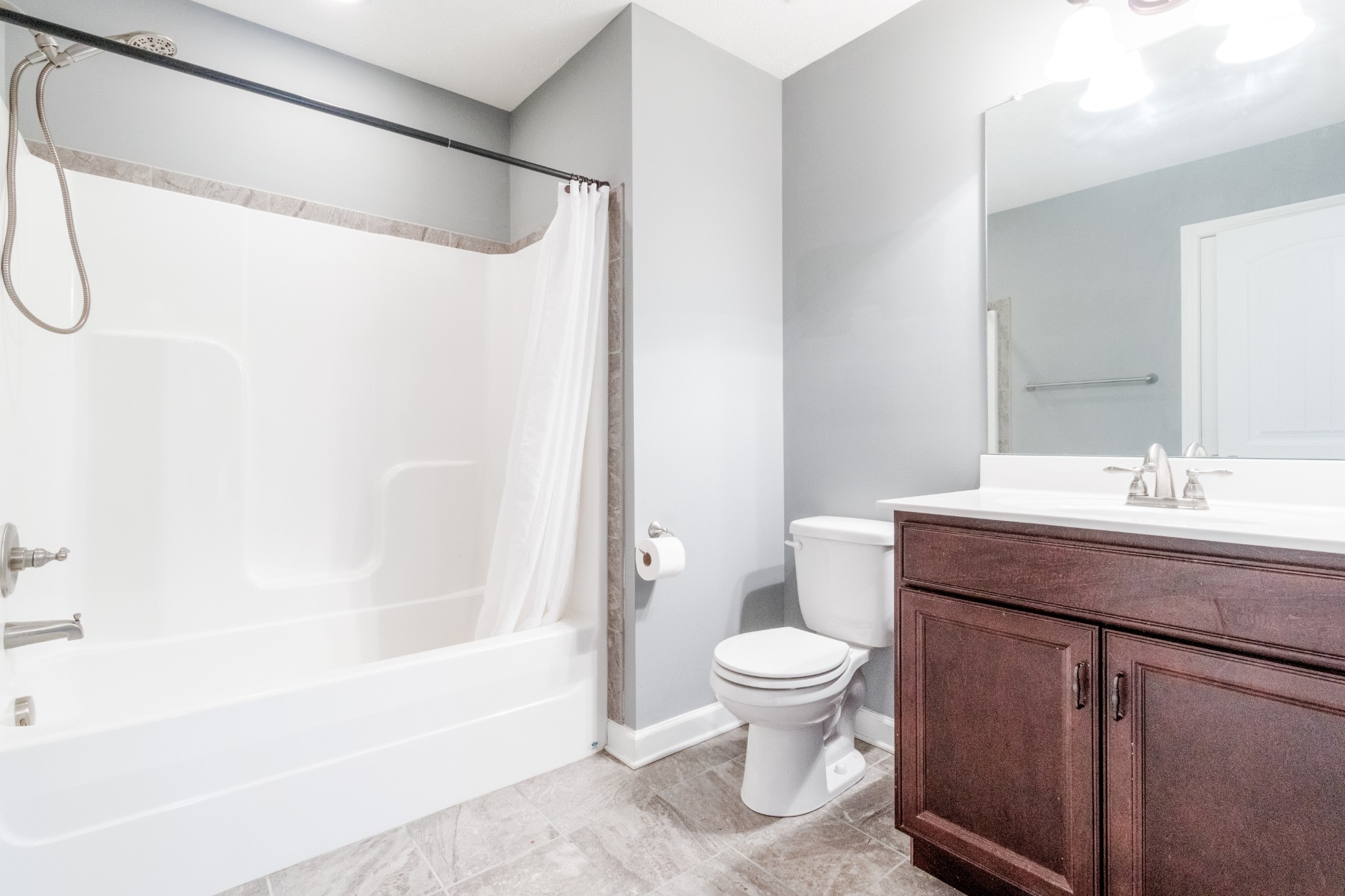 3794 Suiter Road Clarksville, TN 37040 - Photo 19 of 26 a bathroom with a sink a toilet and shower