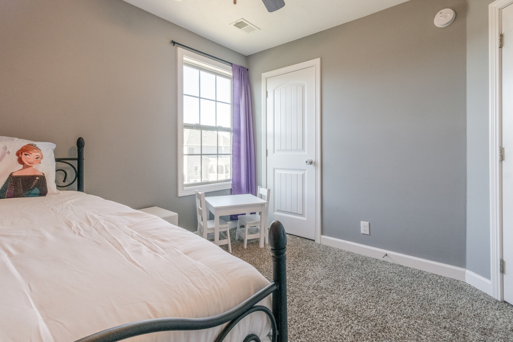 3794 Suiter Road Clarksville, TN 37040 - Photo 21 of 26 a bed sitting in a bedroom next to a window