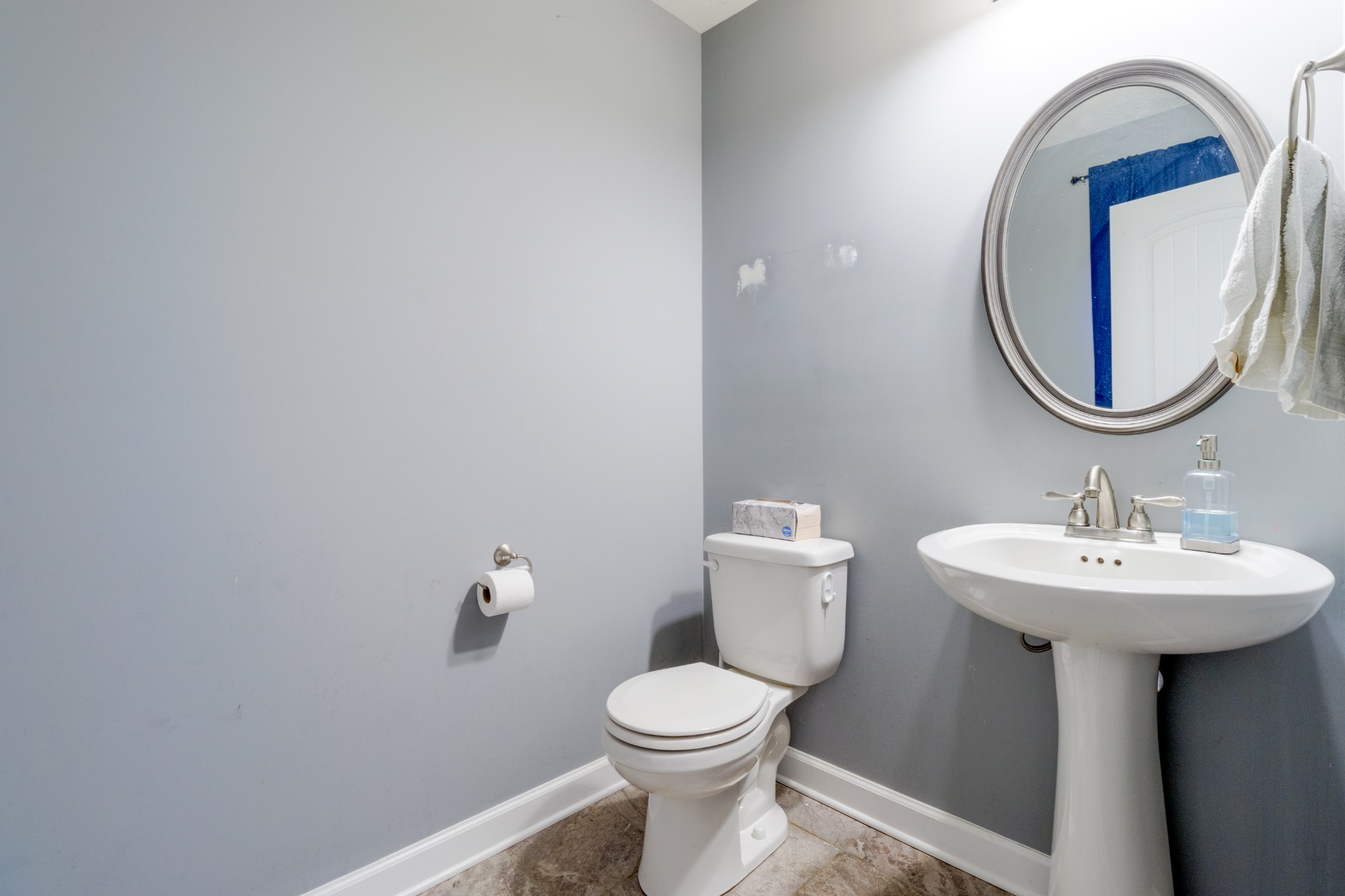 3794 Suiter Road Clarksville, TN 37040 - Photo 8 of 26 a bathroom with a sink a toilet and a mirror