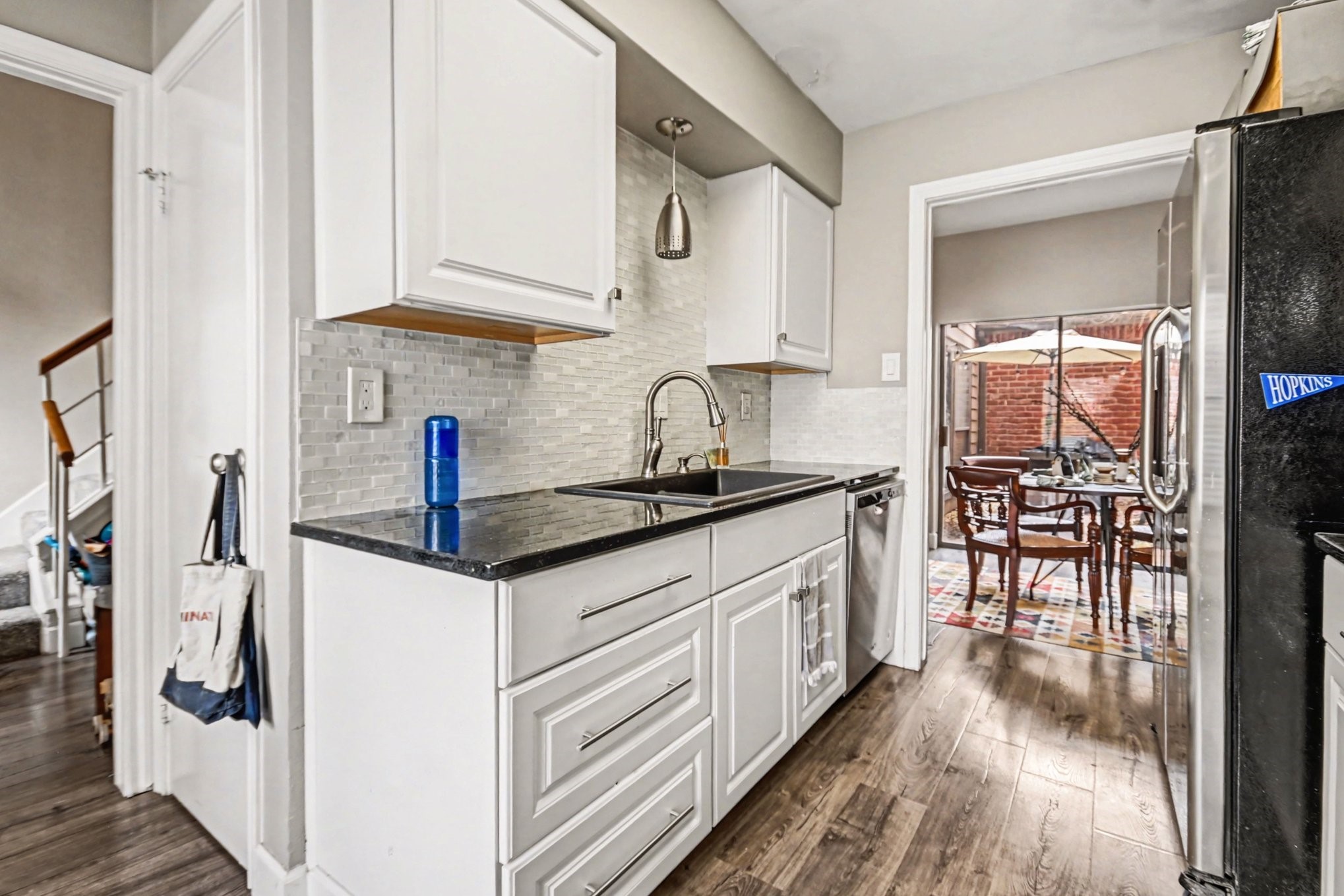 7447 Cambridge Street, Unit 73 Houston, TX 77054 - Photo 14 of 27 a kitchen with stainless steel appliances granite countertop a sink and cabinets