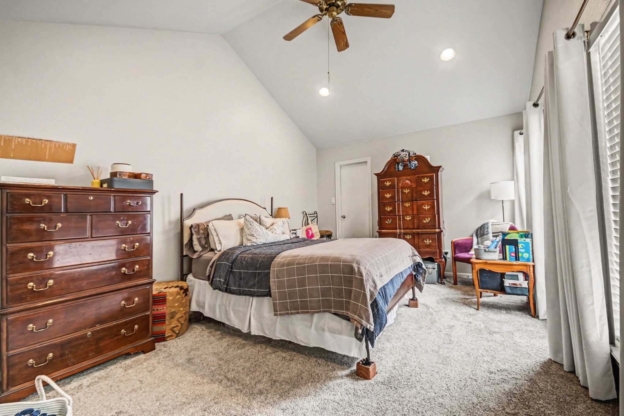 7447 Cambridge Street, Unit 73 Houston, TX 77054 - Photo 16 of 27 a bedroom with a bed and a dresser