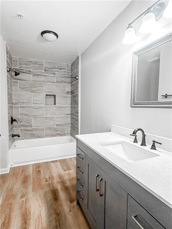 139 Riverstone Commons Circle Canton, GA 30114 - Photo 16 of 28 a bathroom with a sink and a mirror