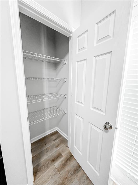 139 Riverstone Commons Circle Canton, GA 30114 - Photo 8 of 28 a view of an empty walk in closet