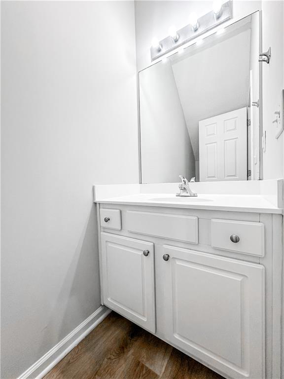 139 Riverstone Commons Circle Canton, GA 30114 - Photo 9 of 28 a bathroom with a sink and a mirror