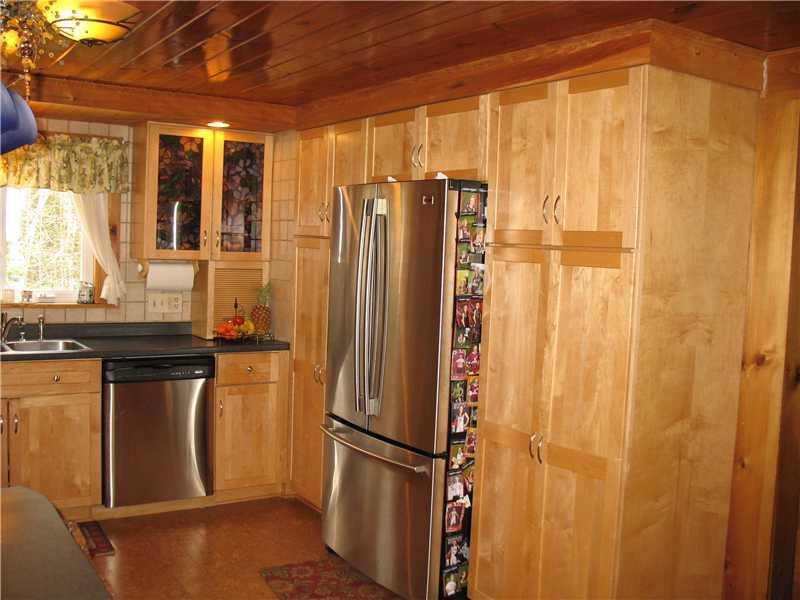 15 Dawes Road Dover-Foxcroft, ME 04426 - Photo 15 of 35 Kitchen. Cork Laminate floor