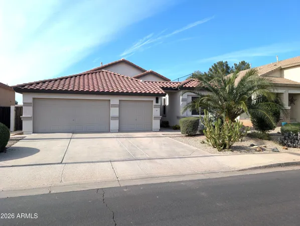a front view of a house with a garage