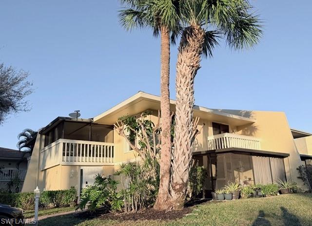925 Palm View Drive, Unit 121 Naples, FL 34110 - Photo 1 of 13 View of building exterior