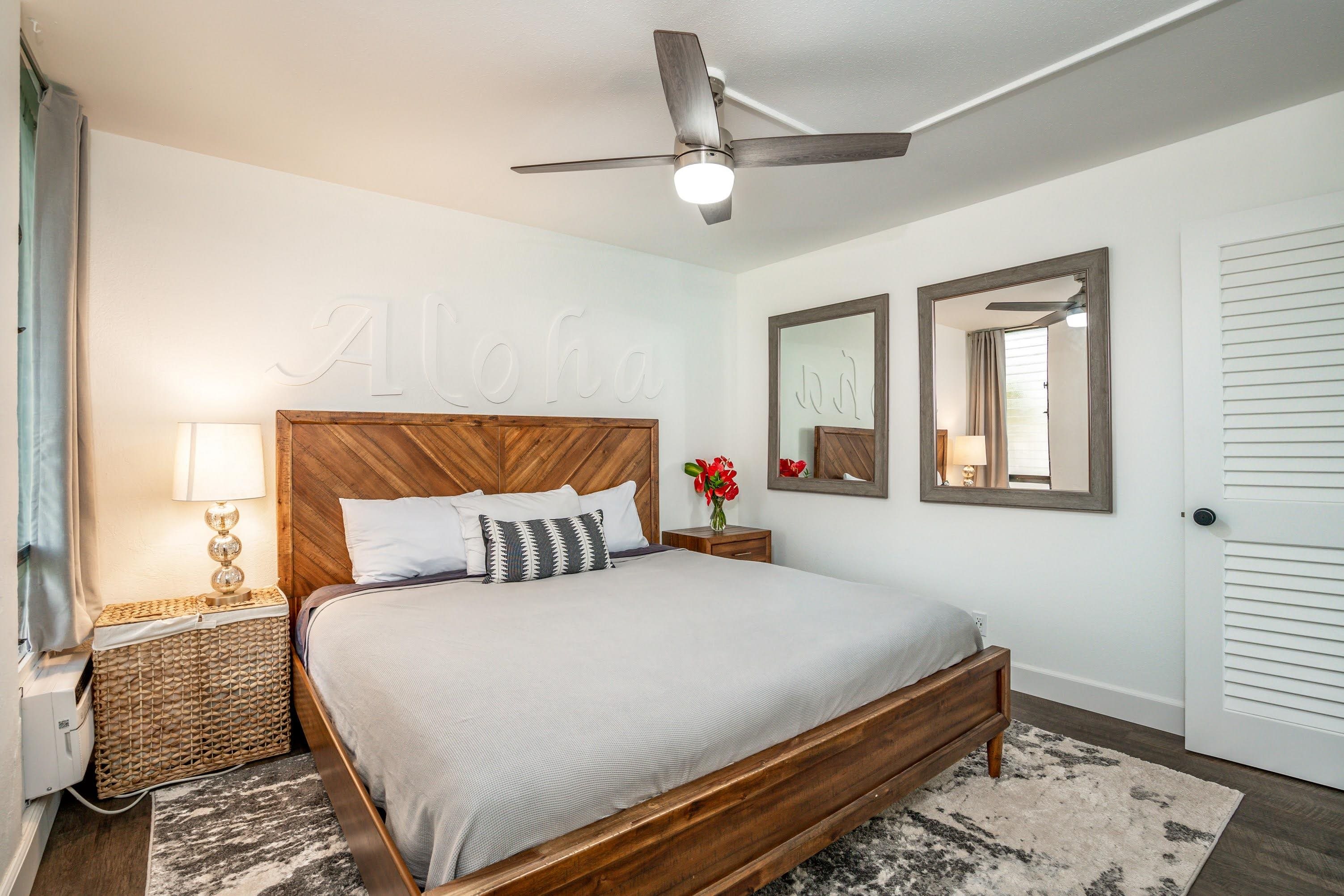 2191 South Kihei Road, Unit 1118 Kihei, HI 96753 - Photo 13 of 40 a bedroom with a bed rug and window