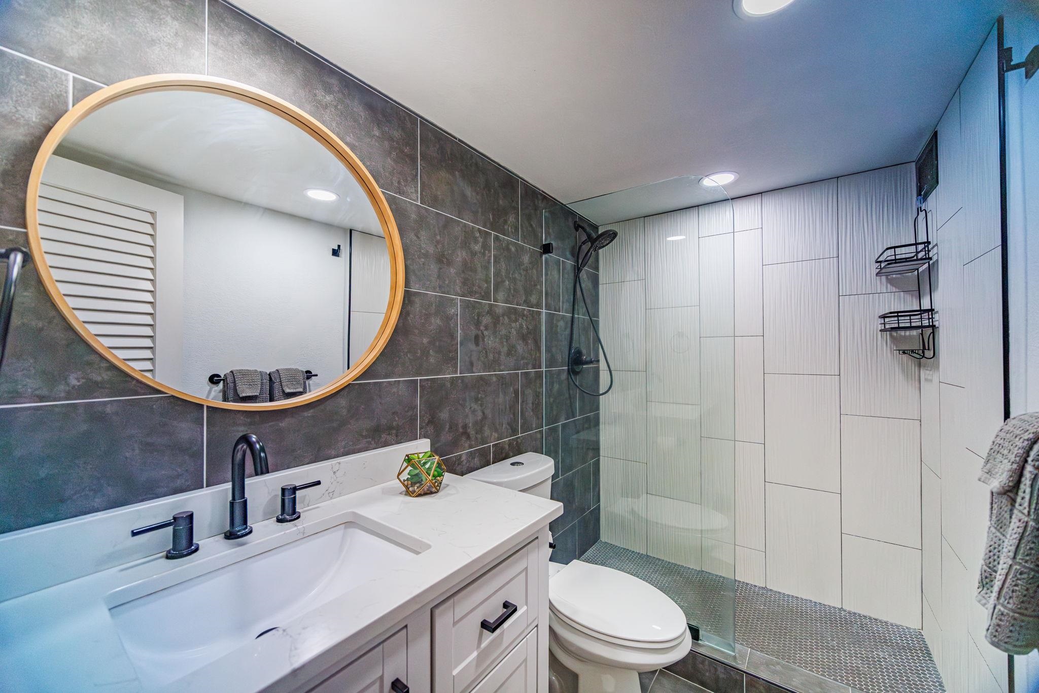 2191 South Kihei Road, Unit 1118 Kihei, HI 96753 - Photo 16 of 40 a bathroom with a sink mirror toilet and shower