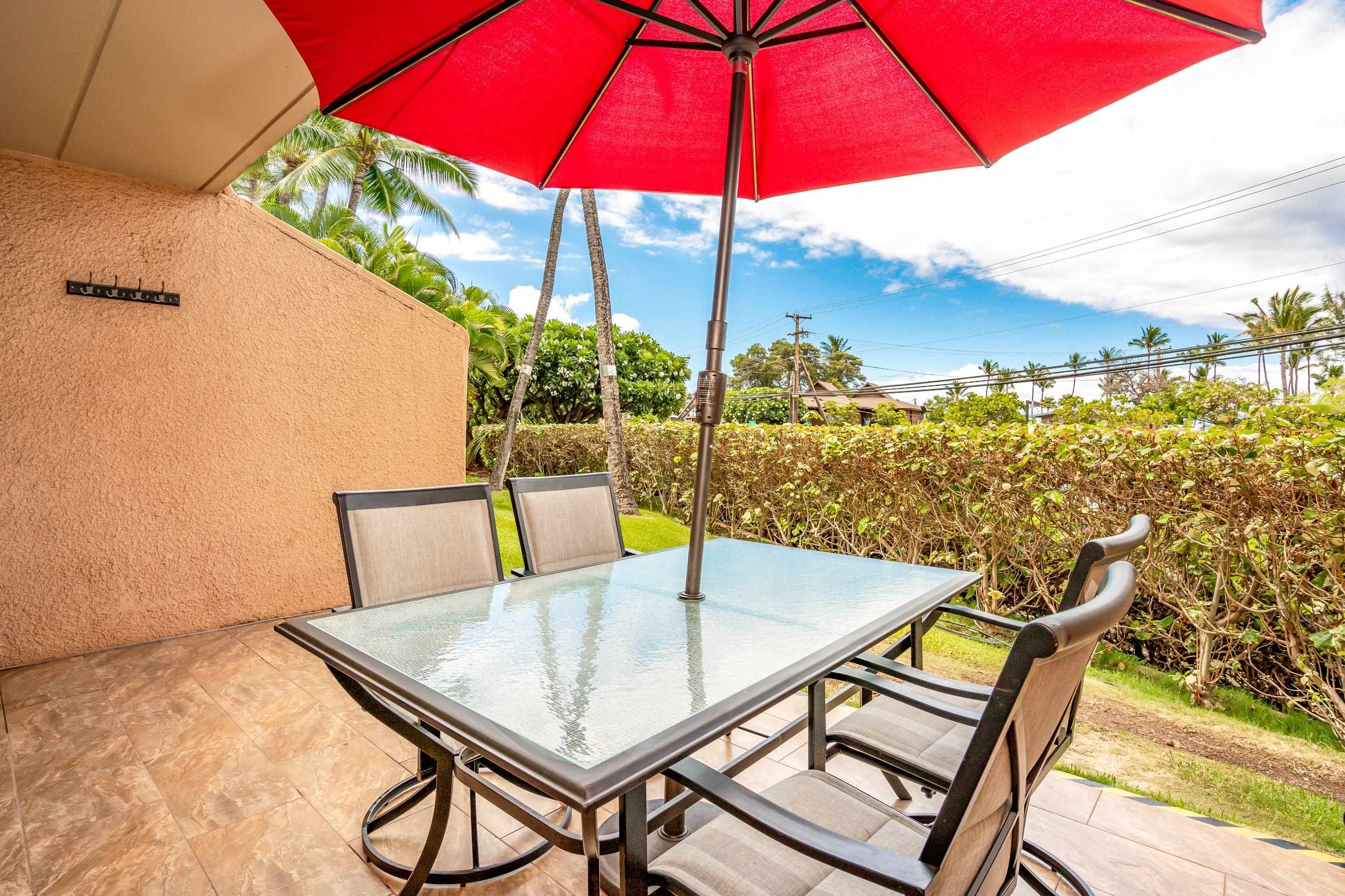 2191 South Kihei Road, Unit 1118 Kihei, HI 96753 - Photo 19 of 40 a view of a terrace with furniture and umbrella