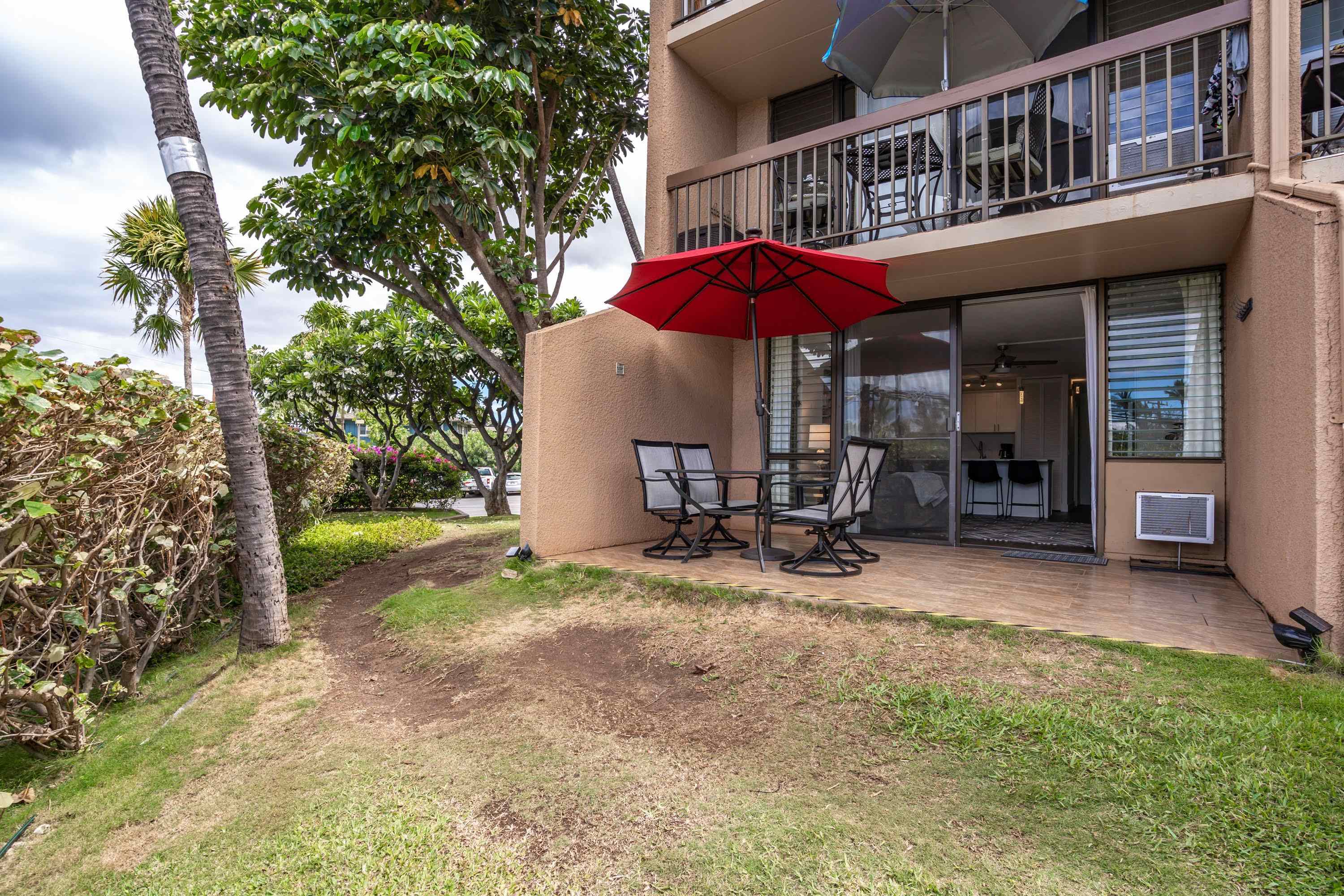 2191 South Kihei Road, Unit 1118 Kihei, HI 96753 - Photo 22 of 40 a view of a house with backyard porch and sitting area