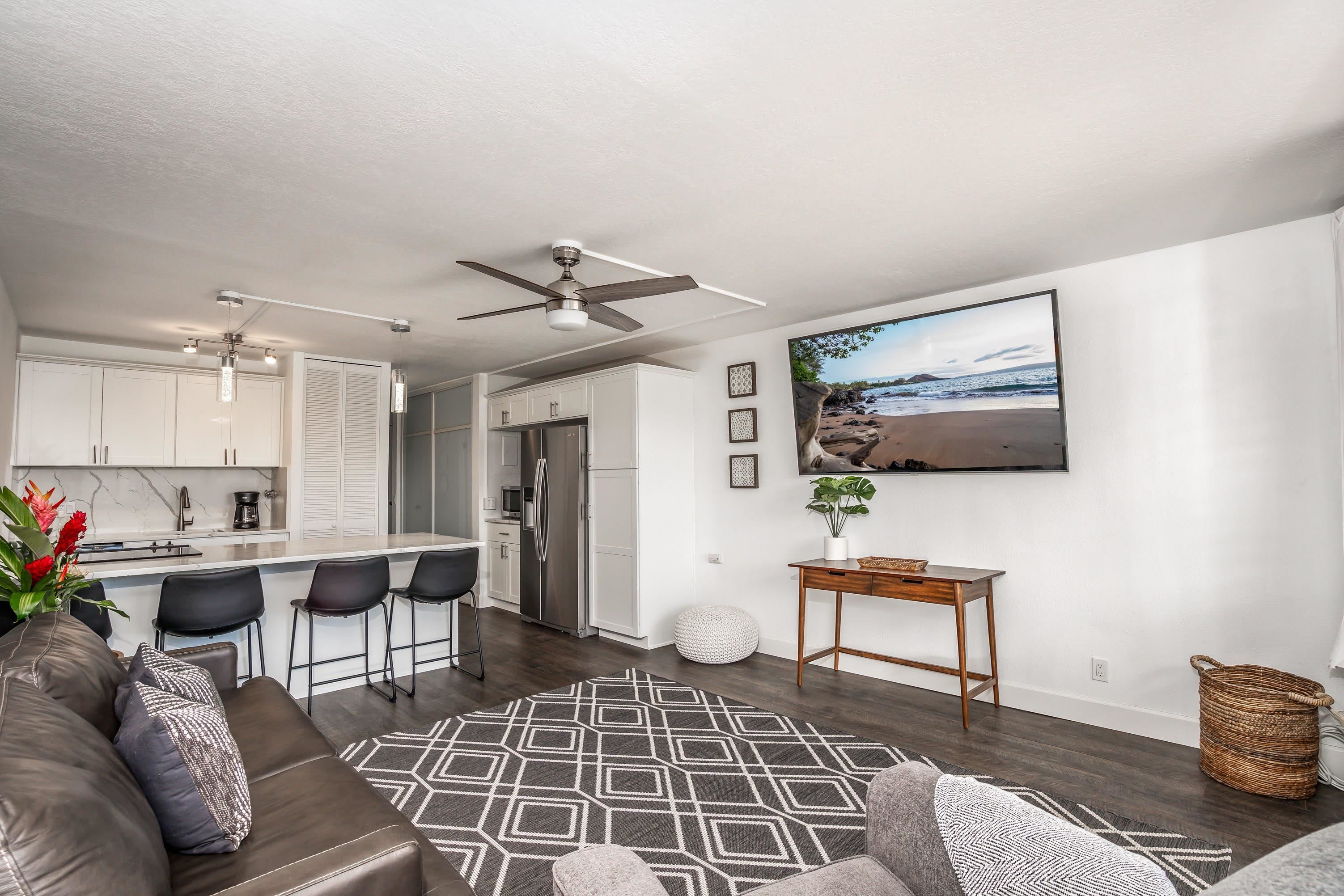 2191 South Kihei Road, Unit 1118 Kihei, HI 96753 - Photo 9 of 40 a living room with furniture and wooden floor
