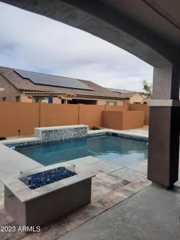a view of a terrace with a barbeque