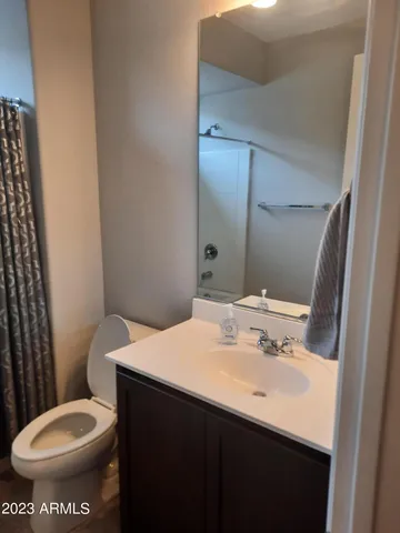 a bathroom with a sink and a toilet