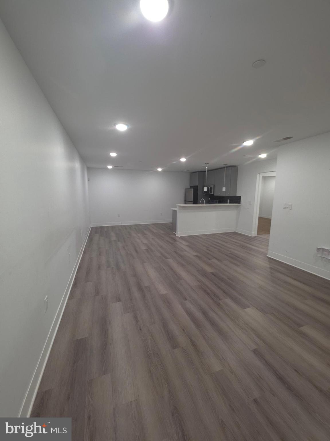 3925 Haverford Avenue, Unit LL6 Philadelphia, PA 19104 - Photo 19 of 36 a view of empty room with wooden floor