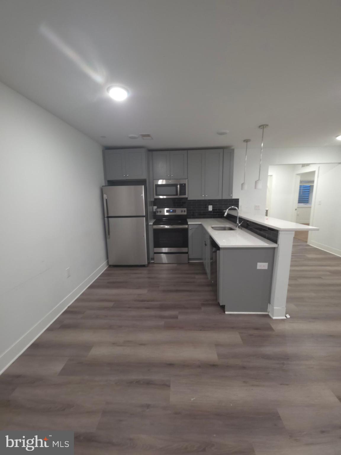 3925 Haverford Avenue, Unit LL6 Philadelphia, PA 19104 - Photo 20 of 36 a view of kitchen with wooden cabinet