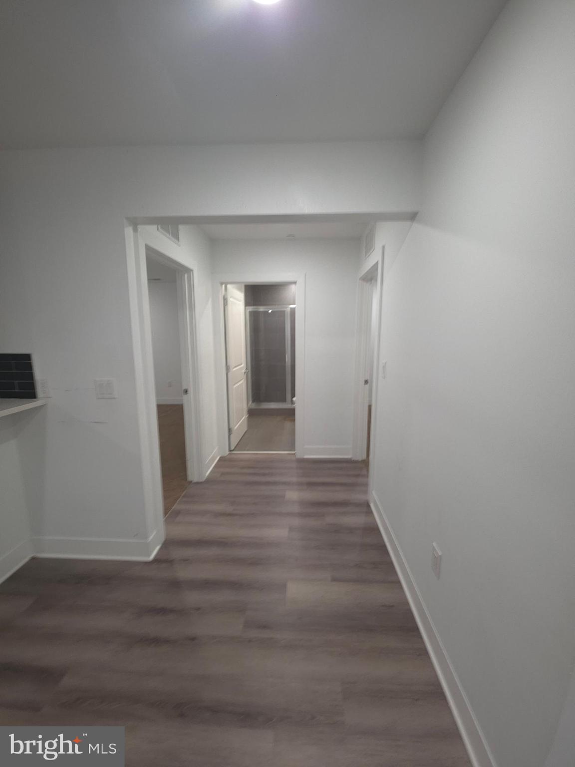3925 Haverford Avenue, Unit LL6 Philadelphia, PA 19104 - Photo 23 of 36 a view of hallway with wooden floor