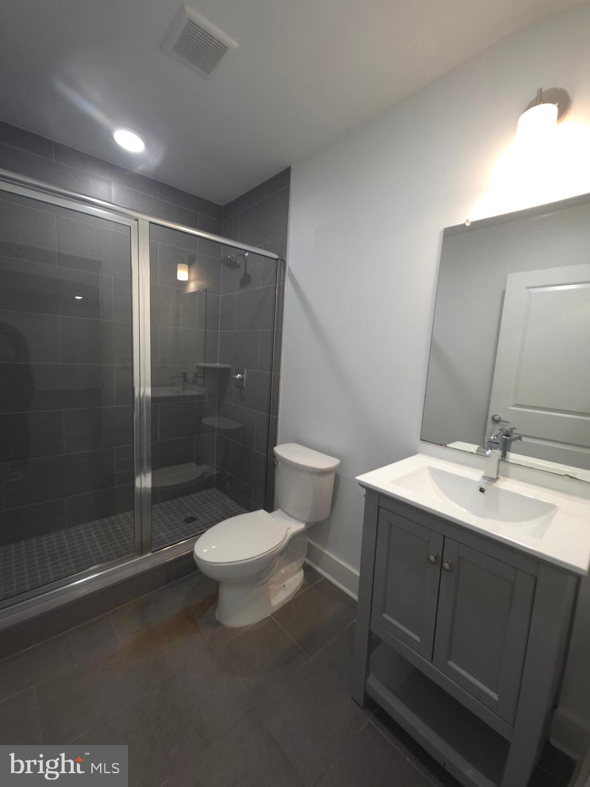 3925 Haverford Avenue, Unit LL6 Philadelphia, PA 19104 - Photo 24 of 36 a bathroom with a sink toilet and shower