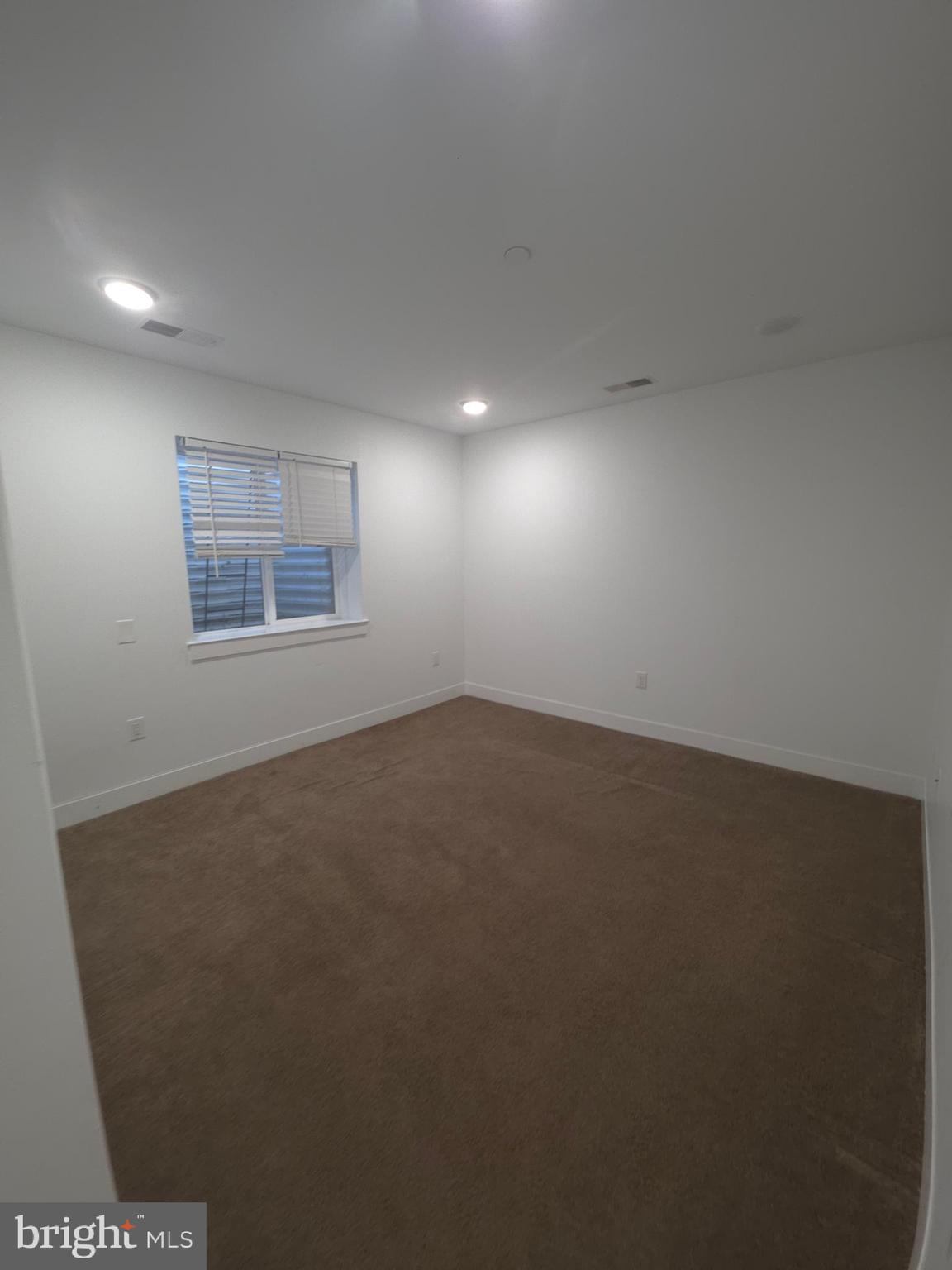 3925 Haverford Avenue, Unit LL6 Philadelphia, PA 19104 - Photo 25 of 36 an empty room with a window