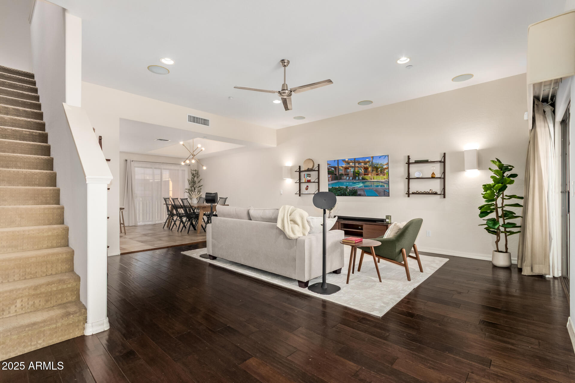 6940 East Cochise Road, Unit 1016 Paradise Valley, AZ 85253 - Photo 4 of 39 a living room with furniture and wooden floor