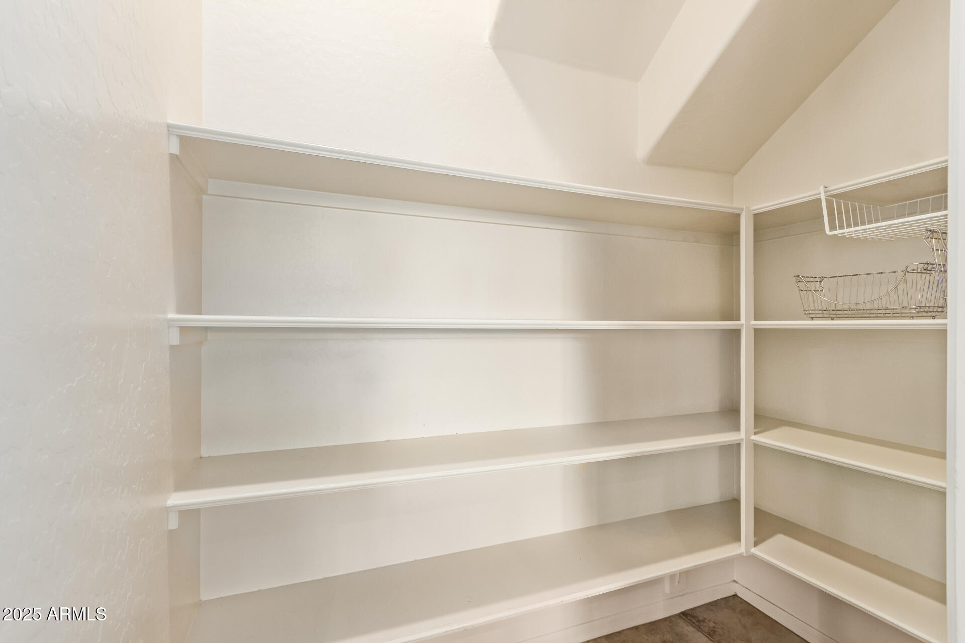 6940 East Cochise Road, Unit 1016 Paradise Valley, AZ 85253 - Photo 7 of 39 a view of an empty walk in closet