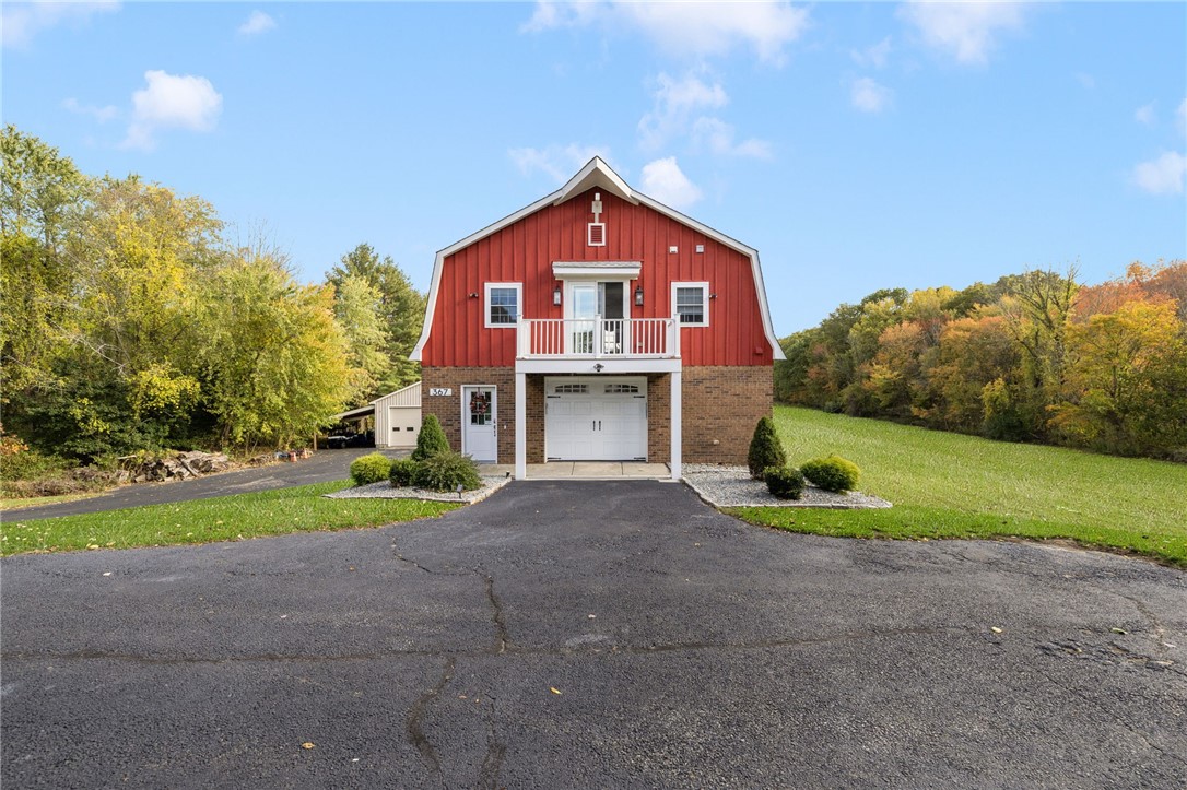 365 West Wrentham Road Cumberland, RI 02864 - Photo 30 of 50 Charming New England barn. Lower level includes handyman workshop (or garage space) with 1/2 bath. Upper level is permitted in-law with beautiful views.