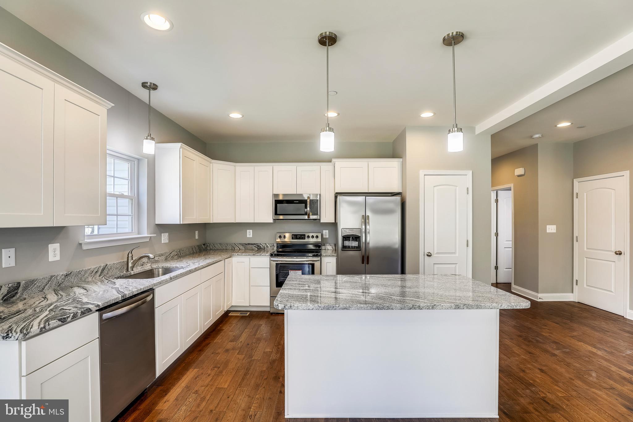 636 Powhatan Beach Road Pasadena, MD 21122 - Photo 11 of 31 UPGRADED CABINETRY/HARDWOOD /GRANITE COUNTERTOPS