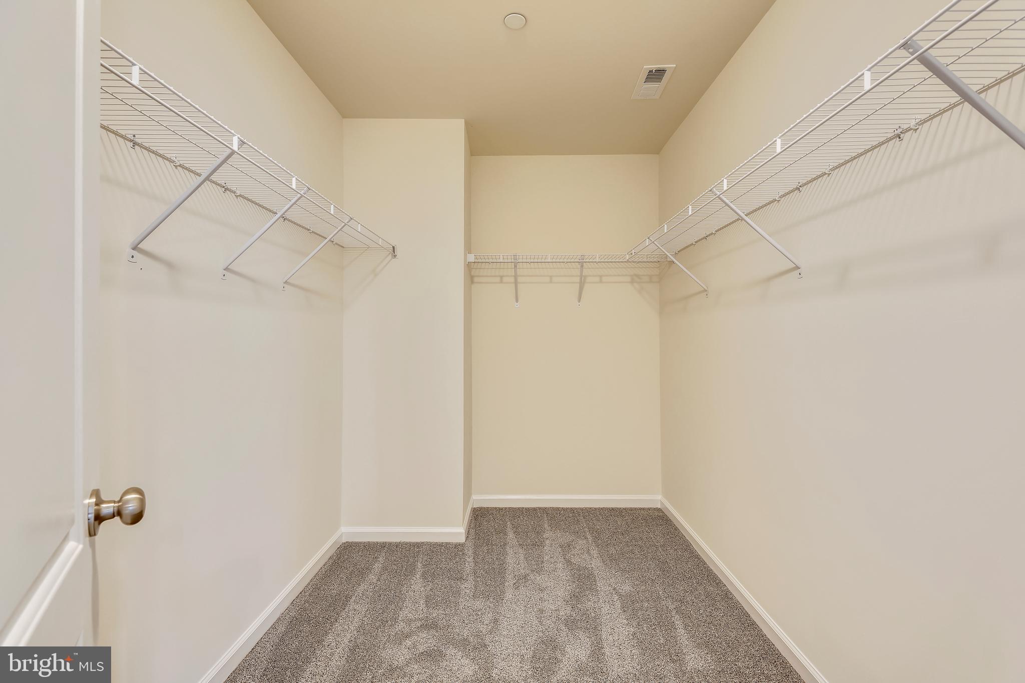 636 Powhatan Beach Road Pasadena, MD 21122 - Photo 24 of 31 MASTER BEDROOM WALK IN CLOSET