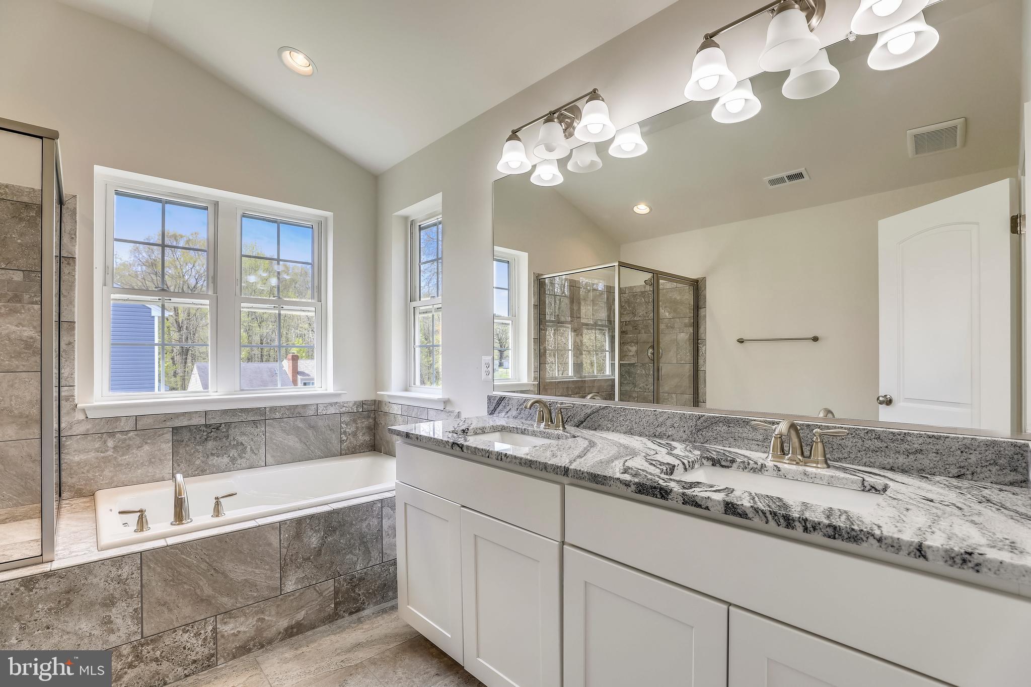 636 Powhatan Beach Road Pasadena, MD 21122 - Photo 26 of 31 MASTER BATH NATURAL LIGHT/GLAZED PORCELAIN FINISH