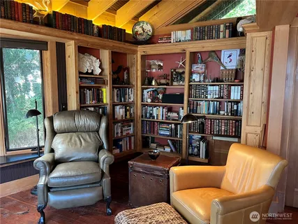 a work room with furniture cabinets and book shelf