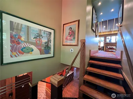 a view of room with furniture and stairs