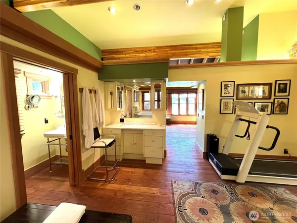 a room with lots of wooden furniture
