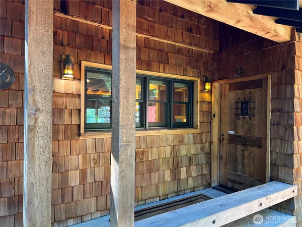 a view of entrance of the house and a window