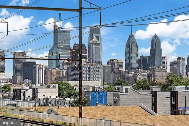 a view of a city with tall buildings