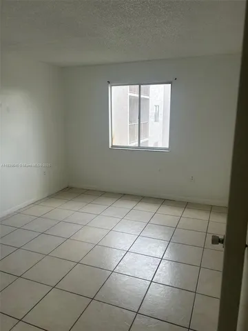 a view of a livingroom with an empty space and a sink