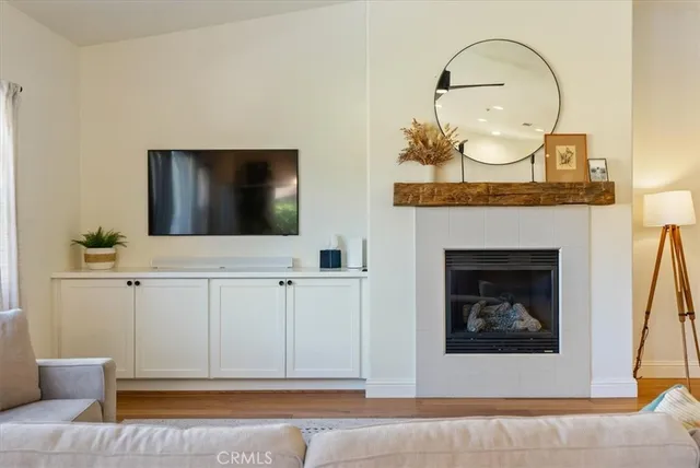 a view of a livingroom with furniture and a fireplace
