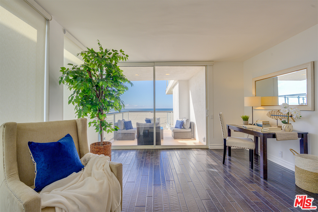 4 Quarterdeck Street, Unit 101 Marina del Rey, CA 90292 - Photo 12 of 29 a living room with furniture and a wooden floor